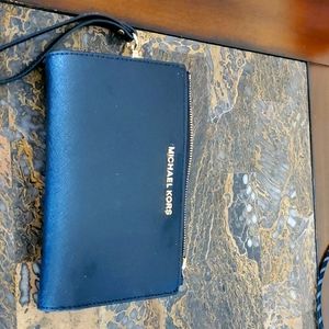 Michael Kors clutch with cell phone holder